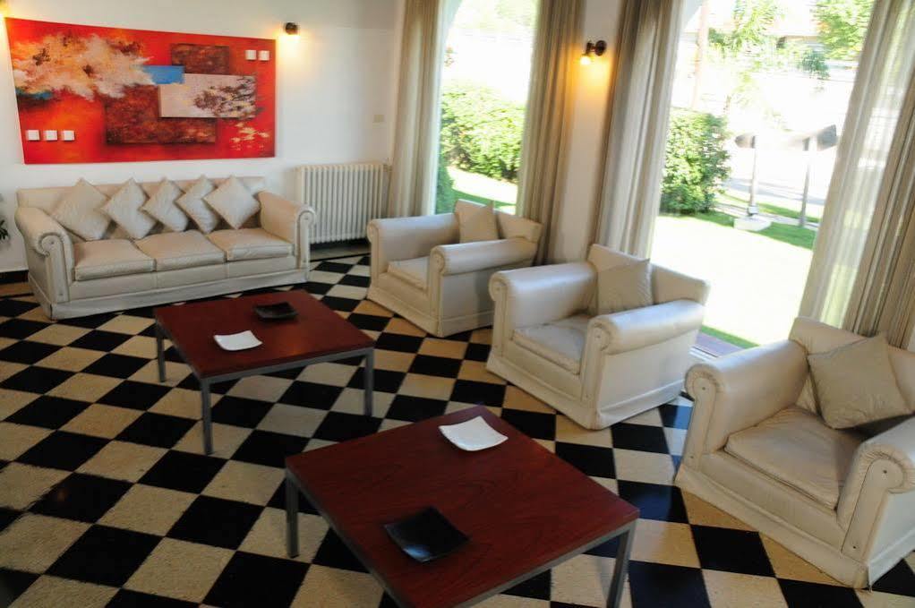 Hostal De La Costa Villa Carlos Paz Bagian luar foto